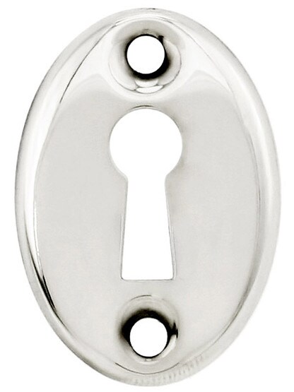 Stamped Brass Oval Keyhole Cover in Polished Nickel.